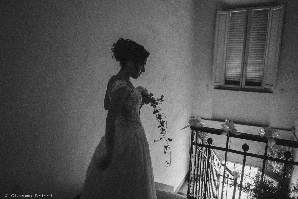 Foto artistica in controluce della sposa, fotografo ricevimento matrimonio a pisa, palazzo dei dodici